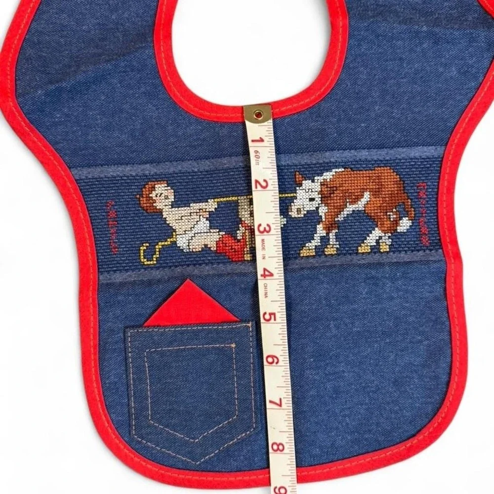 vintage Charles Craft denim cross-stitch baby‎ bib featuring a cowboy and calf